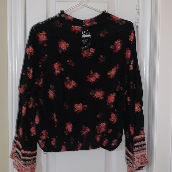 Floral blouse with bell sleeves. - Picture 2 of 3